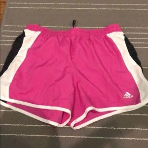 Pink,black, and white adidas shorts